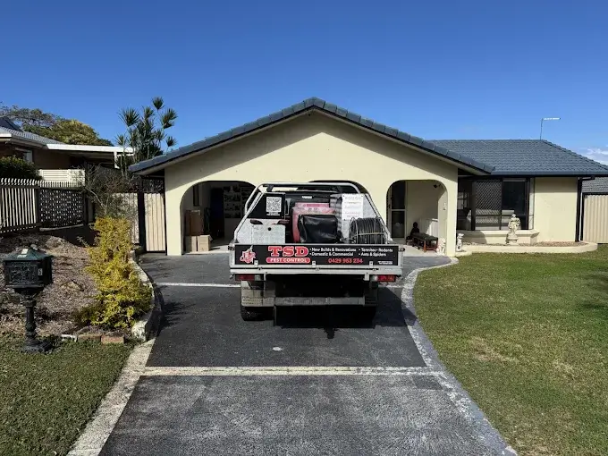 Pest control technician inspecting a residential area for pest infestations.